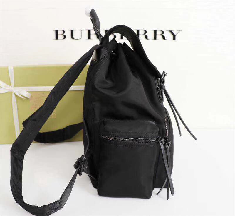 C3 Official Website Sync: New Model!! Burberry Iconic Military Backpack! Lightweight and Rainproof! Dynamic Abstract Colorful Patterns Combined with Smooth Cowhide Edging, Inspired by the iconic Burberry Trench coat fabric, Made of Flexible Nylon Material — image 2