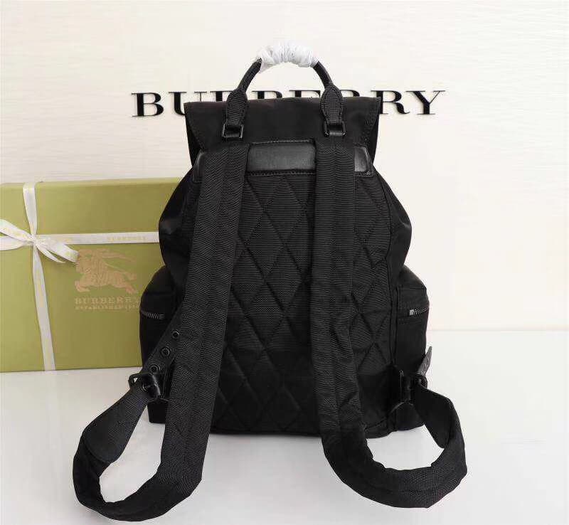 C3 Official Website Sync: New Model!! Burberry Iconic Military Backpack! Lightweight and Rainproof! Dynamic Abstract Colorful Patterns Combined with Smooth Cowhide Edging, Inspired by the iconic Burberry Trench coat fabric, Made of Flexible Nylon Material — image 3