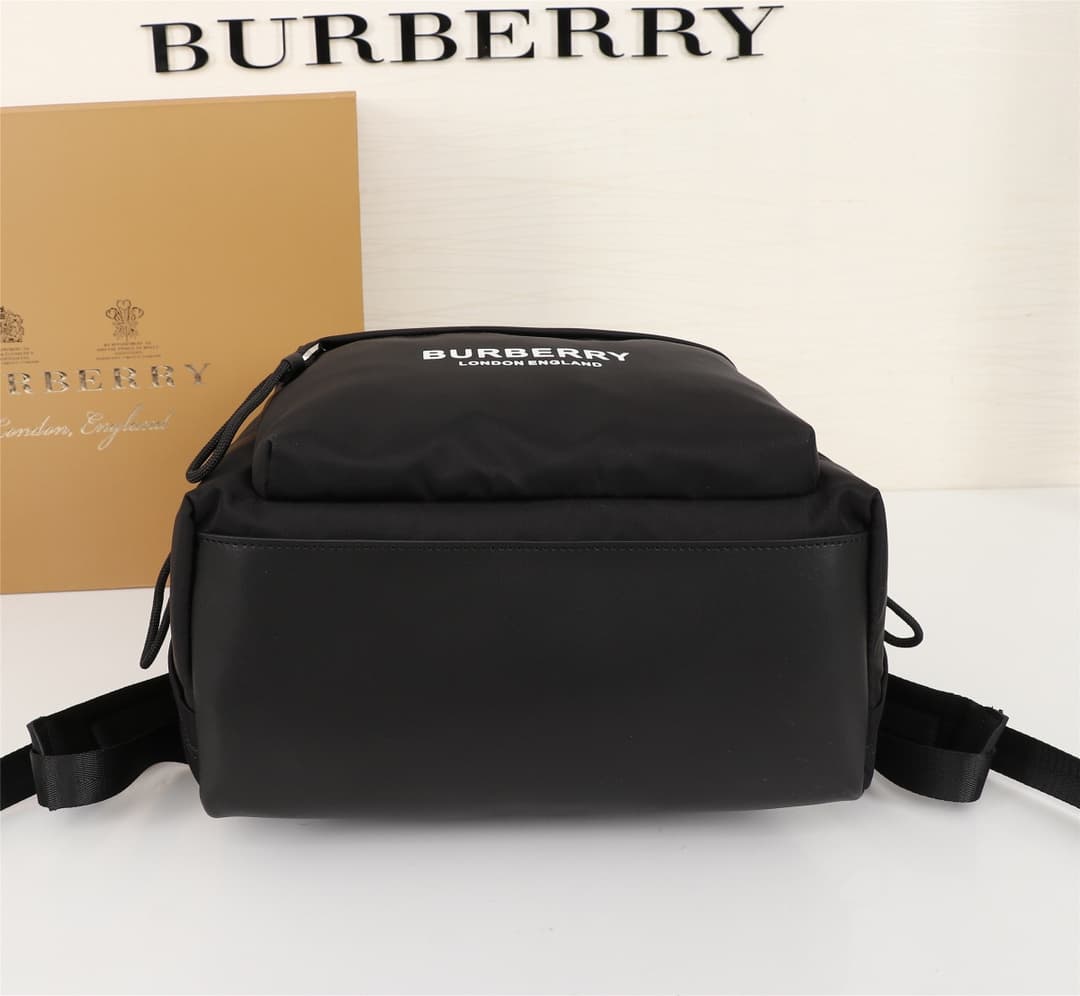 C10 Burberry New Vintage/retro Nylon Backpack with Updated Brand Logo, Smooth Leather Trim, and Burberry Letter Print Micro-Logo on Shoulders. Leather material at the bottom, double zipper closure, shiny metal details, and wash label are identical! Highes — image 8