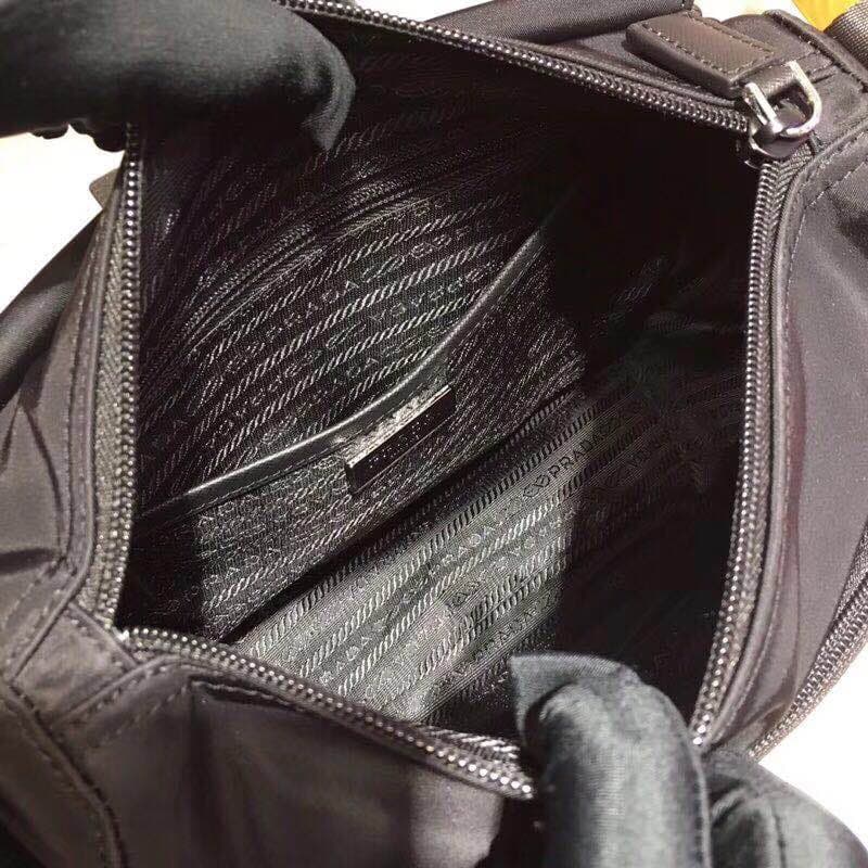 C6964 🆕🆕 Popular 1BD994 product – original style! 🤙🤙 Made with imported nylon material and Saffiano leather trim. Adjustable fabric straps, stainless steel accessories, triangular enamel logos on the sides. Zipper and buckle closure. Two outer pockets; on — image 8