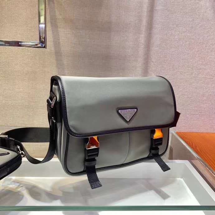 C7014 🎉New Color 🎉2VD769B🎉Original product 👍👍 This nylon flap handbag features classic Saffiano leather trim, two side-opening closures, and a distinctive triangular metal logo, showcasing a fashionable design. It’s made of imported nylon and Saffiano lea — image 2