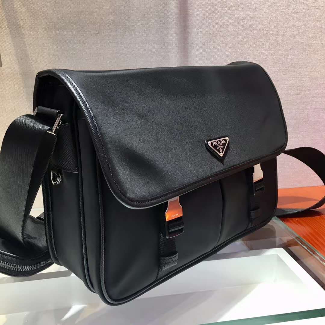 C7013 P Store boutique’s latest model 😎 Men’s crossbody bag 2VD768 has arrived. Made of nylon, with Saffiano leather trim, metal hardware components, two side clasps, adjustable nylon shoulder strap, zippered small pocket, three external pockets – two of  — image 3