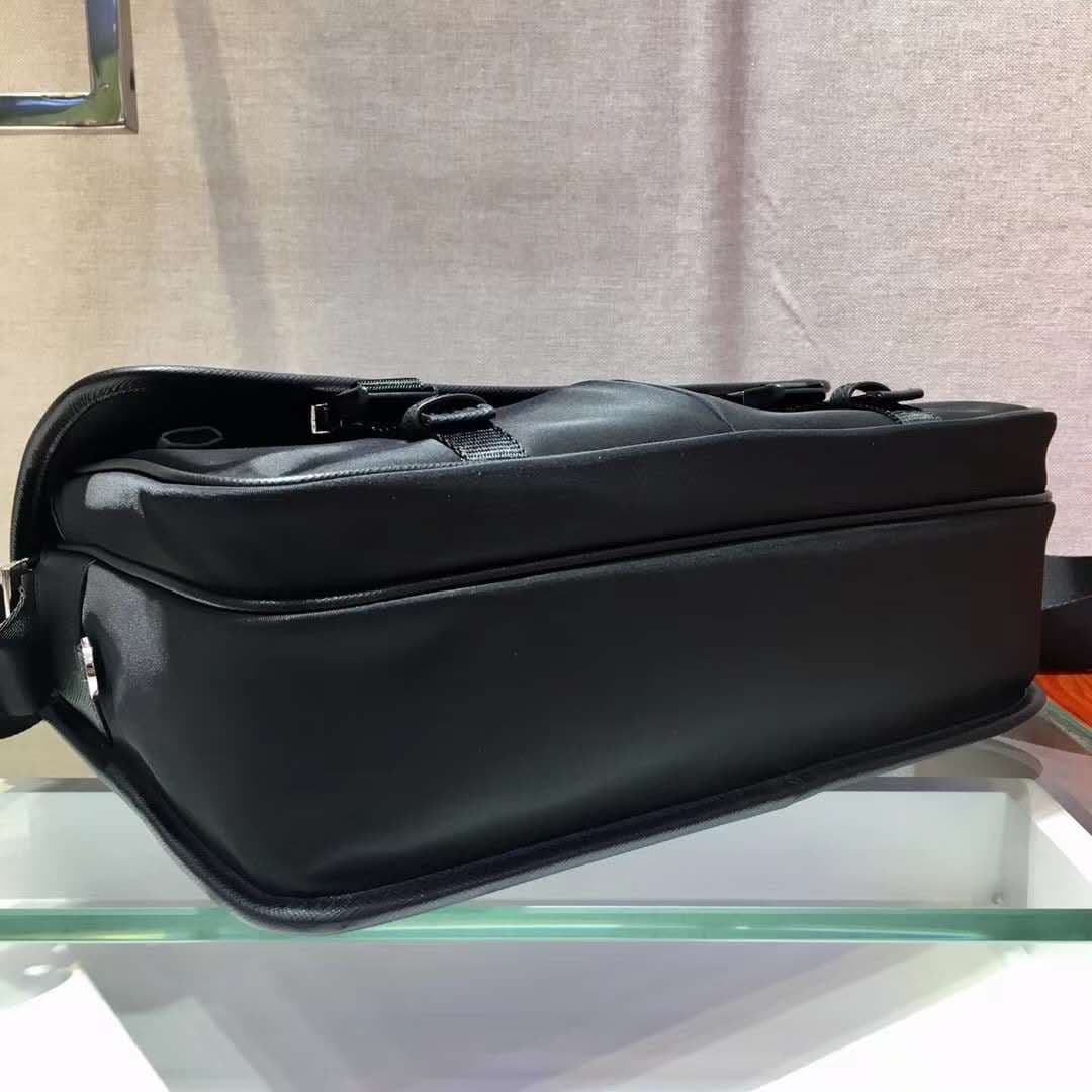 C7013 P Store boutique’s latest model 😎 Men’s crossbody bag 2VD768 has arrived. Made of nylon, with Saffiano leather trim, metal hardware components, two side clasps, adjustable nylon shoulder strap, zippered small pocket, three external pockets – two of  — image 5