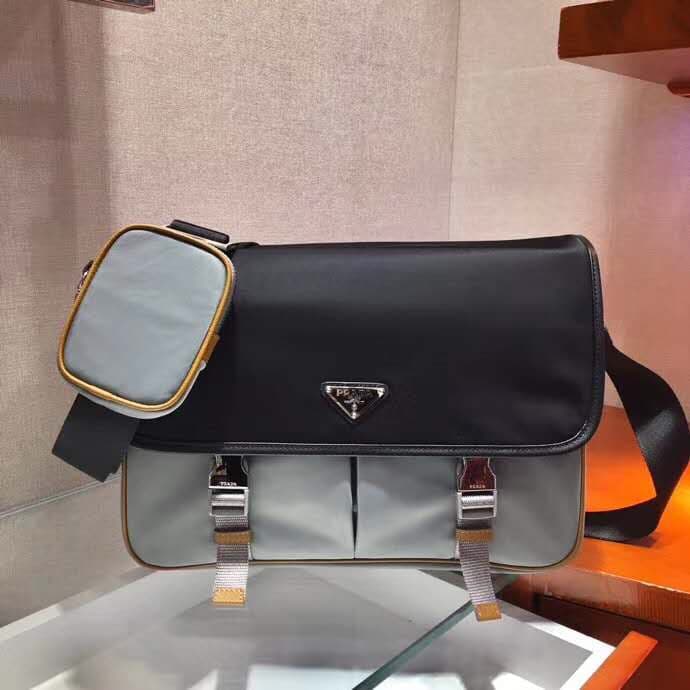 C7012 🎉New Color 🎉2VD768B 🎉Original product 👍👍 This nylon flap handbag features classic Saffiano leather trim, two side-closing zippers, and a distinctive triangular metal logo, highlighting a stylish design. It’s made of imported nylon and Saffiano leath — image 1