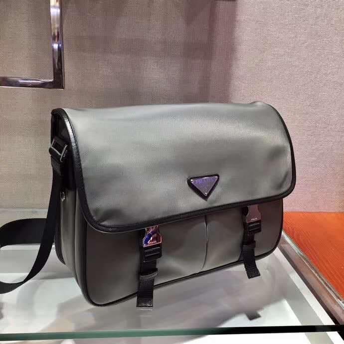 C7011 🎉New color 🎉2VD768B 🎉Original product 👍👍 This nylon flap handbag features classic Saffiano leather trim, with two side-opening zippers and a distinctive triangular metal logo. It showcases a stylish design, made from imported nylon and Saffiano leat — image 2
