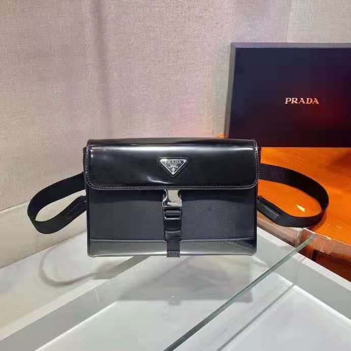 C7010 🎉 New postal courier bag 🎉 2VD044 is available now 👏👏 This shoulder bag is made of Re-Nylon, a recycled nylon material, with leather details, offering a modern and stylish design. ECONYL® is a type of recycled nylon yarn produced from purified ocean — image 3