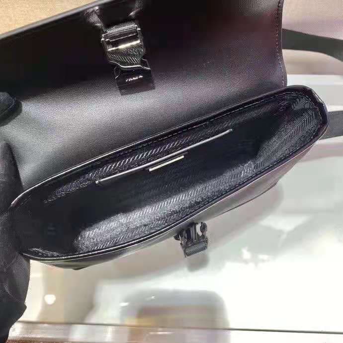 C7010 🎉 New postal courier bag 🎉 2VD044 is available now 👏👏 This shoulder bag is made of Re-Nylon, a recycled nylon material, with leather details, offering a modern and stylish design. ECONYL® is a type of recycled nylon yarn produced from purified ocean — image 7