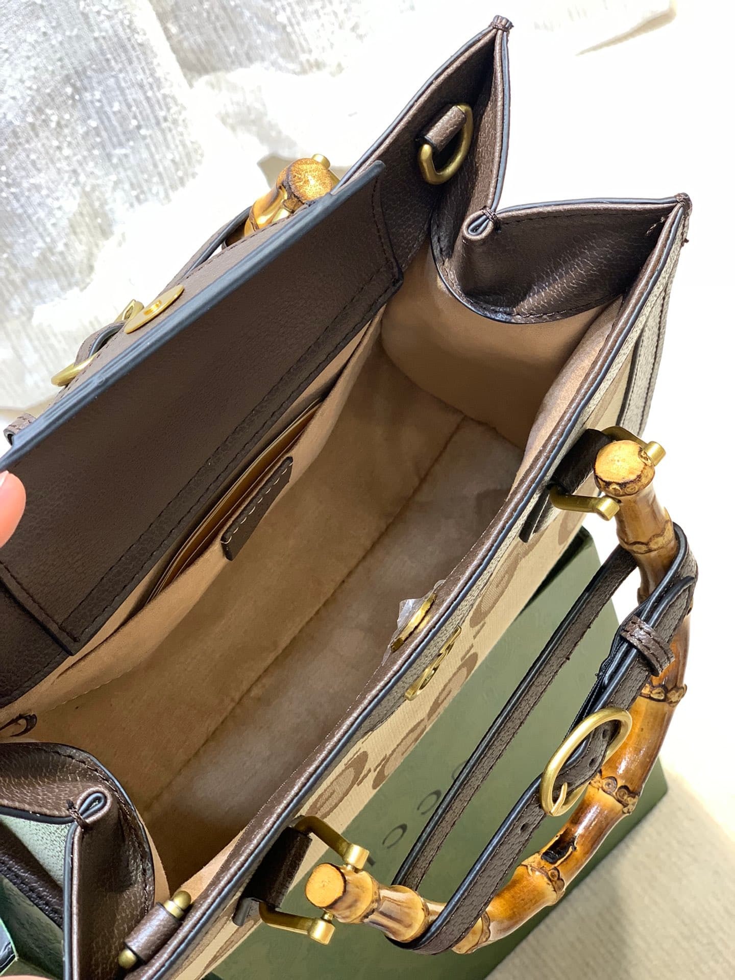 C3995 Bamboo Jade Mini Handbag  
Gucci’s “Aria – Musical Melodies” collection reinterprets classic elements using modern techniques. The bamboo jade is one of Gucci’s iconic elements, which have appeared in various collections since the 1990s. After more  — image 6