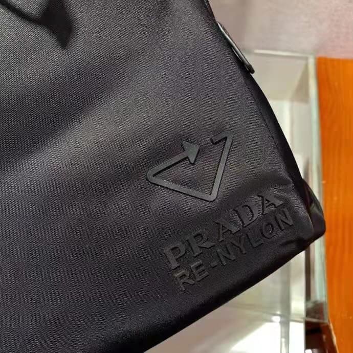 C7025 🎉 Environmental Protection Collection🎉2VZ135🎉🎉 This backpack is made from innovative recycled nylon material, featuring a classic design. It comes with a flap with straps and buttons, as well as four external zipper pockets. The back panel features  — image 7