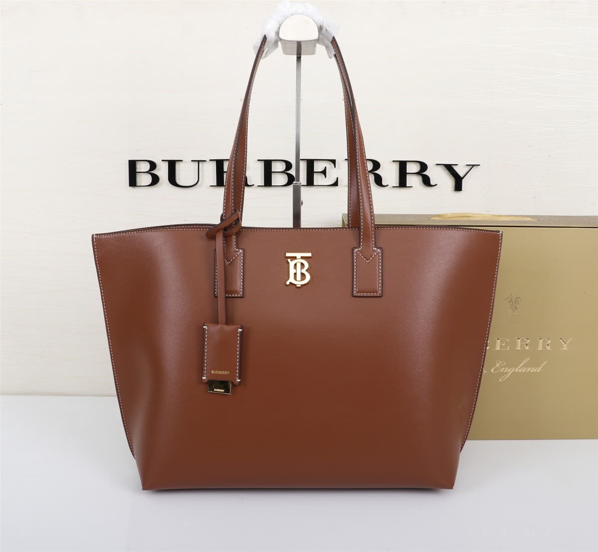C49 🔥🔥B brand’s tote bags feature ample space. Made from high-quality Italian tanned leather.[Color] Decorative details with a shiny finish; T/B exclusive logos, along with mirror pendants covered in leather. 34 x 14 x 28cm, 2088 — image 1