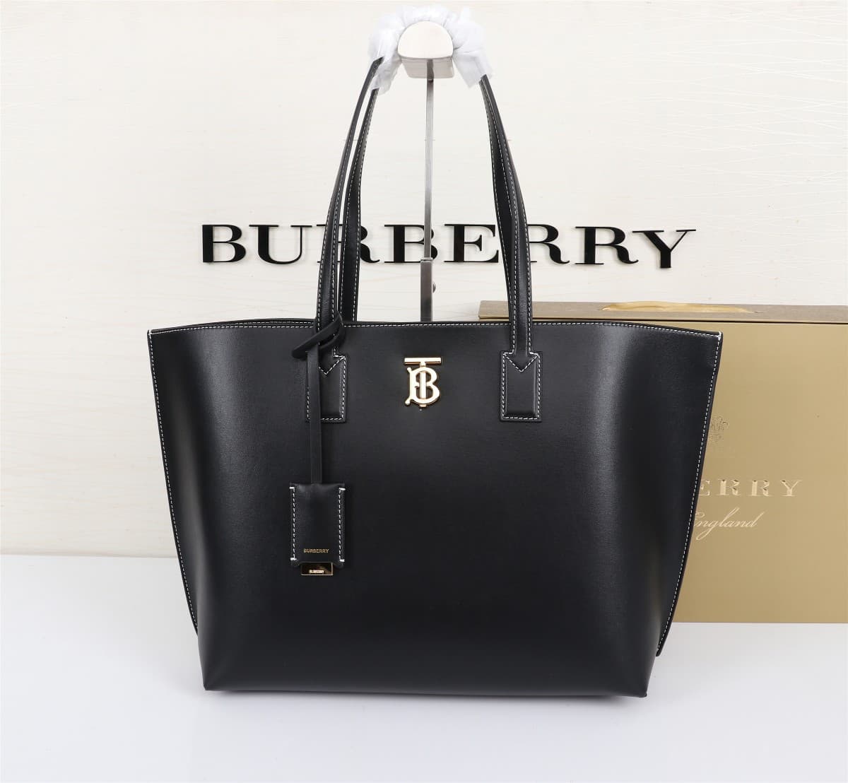 C48 🔥🔥B brand’s tote bags feature ample space. Made from high-quality Italian tanned Guimard leather.[Color] Decorative accents with a shiny finish; T/B-specific branding, along with a mirror ornament covered in leather. 34 x 14 x 28cm, 2088 — image 1