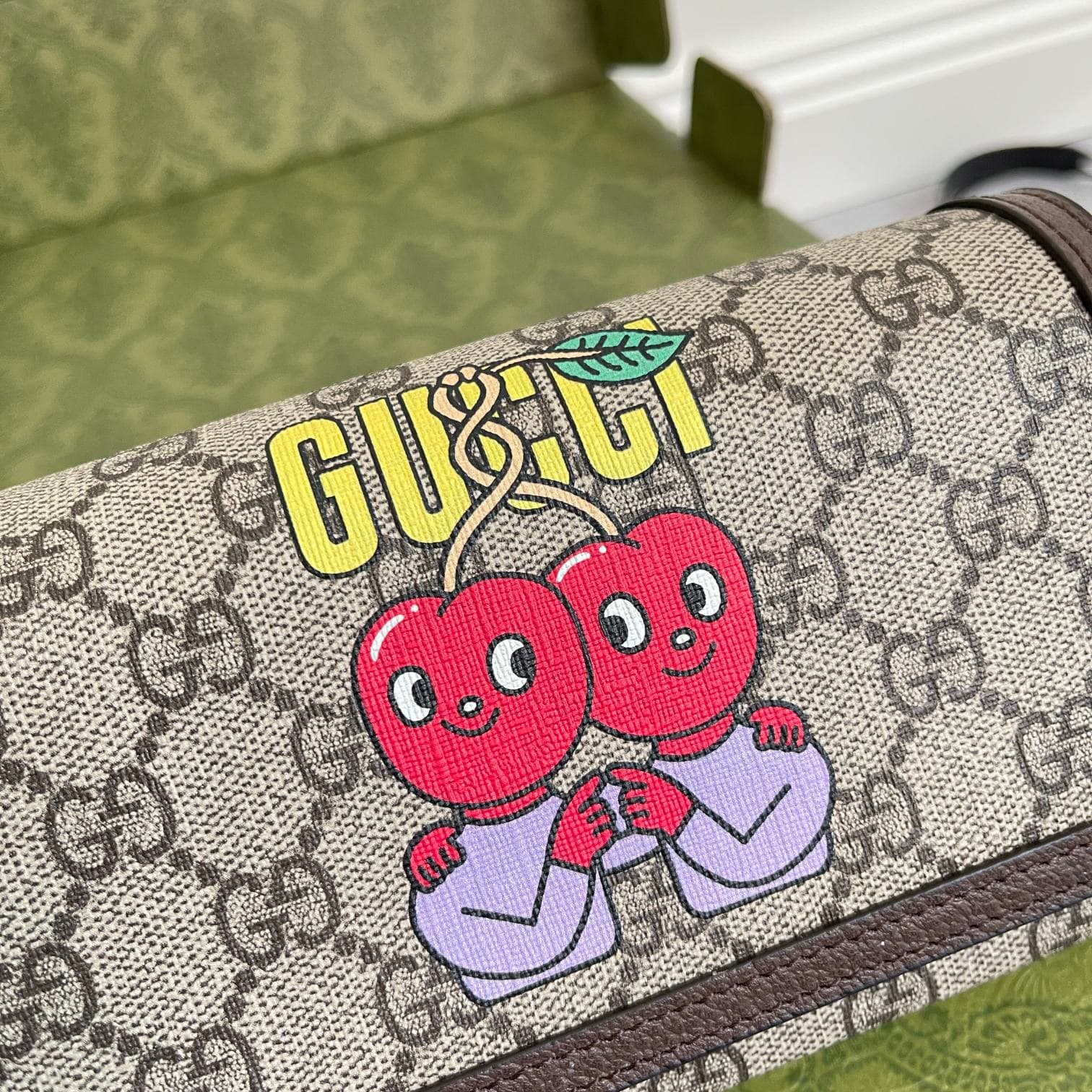 C4067 ‼️The Gucci cherry print mini handbag features designs created by Chilean cartoonist and illustrator Pablo Delcielo. This fashion collection, “Gucci’s Love March,” adds a playful touch of charm. Vibrant mysterious creatures and funky fruit character — image 3