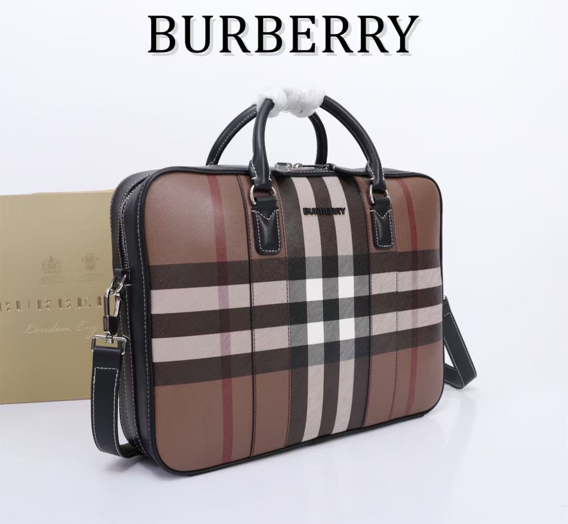 C8230 -B Brand’s latest briefcase is crafted from checked and Italian tanned leather, with a branded logo design. It can be carried in a handbag style, or worn on the shoulder using detachable straps. At least 30% of the materials used in this product are — image 3