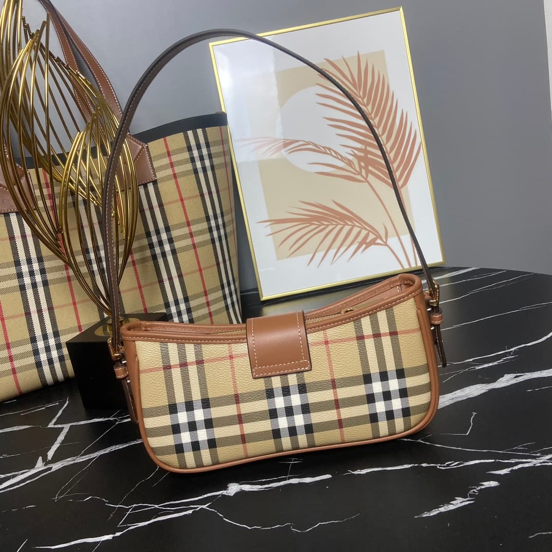 C19 B brand's latest Italian-made bag style, decorated with Burberry plaid pattern. Standout buckle belt design inspired by the brand's iconic Trench coat. Model 3308, sizes: 26 x 6 x 12 , — image 2
