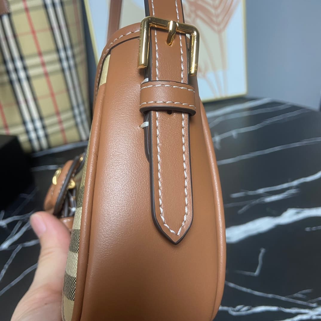 C19 B brand's latest Italian-made bag style, decorated with Burberry plaid pattern. Standout buckle belt design inspired by the brand's iconic Trench coat. Model 3308, sizes: 26 x 6 x 12 , — image 8