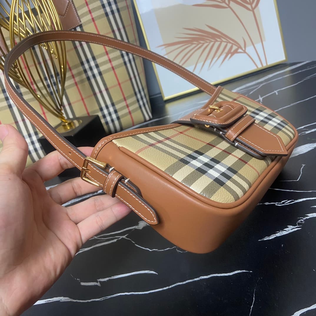 C19 B brand's latest Italian-made bag style, decorated with Burberry plaid pattern. Standout buckle belt design inspired by the brand's iconic Trench coat. Model 3308, sizes: 26 x 6 x 12 , — image 3