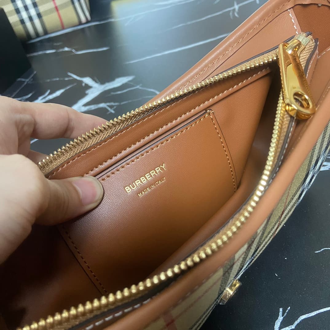 C19 B brand's latest Italian-made bag style, decorated with Burberry plaid pattern. Standout buckle belt design inspired by the brand's iconic Trench coat. Model 3308, sizes: 26 x 6 x 12 , — image 6