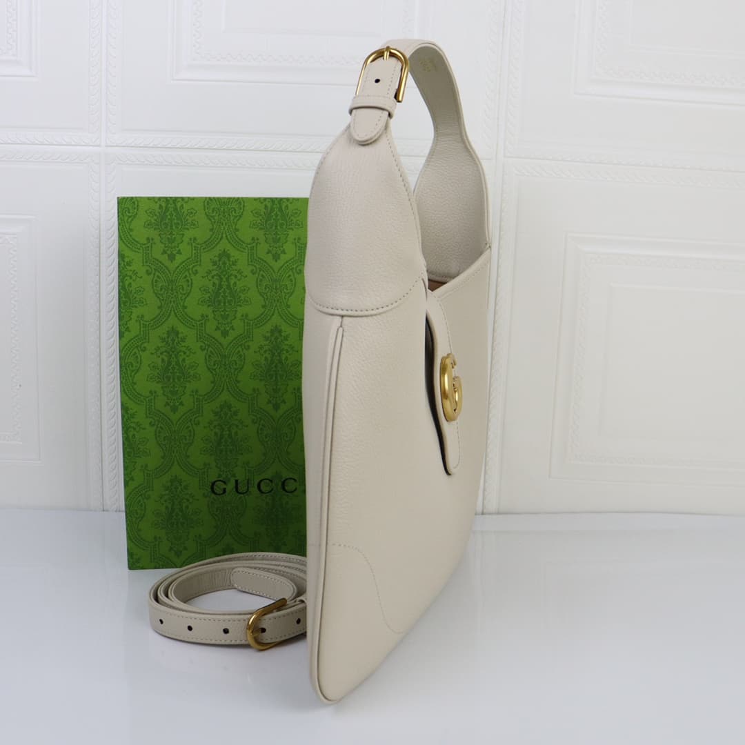 C4037 🌟 The “Aphrodite Collection” medium crescent-shaped shoulder bag. The “GucciCosmogonie” collection is presented at the historic Monte Carlo in Italy. On the runway, aesthetic elements from different times and locations blend together, connecting the — image 3
