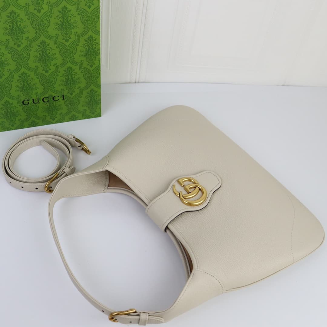 C4037 🌟 The “Aphrodite Collection” medium crescent-shaped shoulder bag. The “GucciCosmogonie” collection is presented at the historic Monte Carlo in Italy. On the runway, aesthetic elements from different times and locations blend together, connecting the — image 6