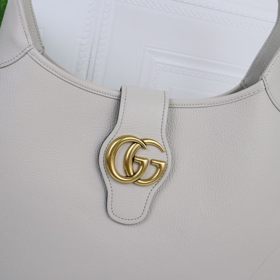C4037 🌟 The “Aphrodite Collection” medium crescent-shaped shoulder bag. The “GucciCosmogonie” collection is presented at the historic Monte Carlo in Italy. On the runway, aesthetic elements from different times and locations blend together, connecting the — image 2