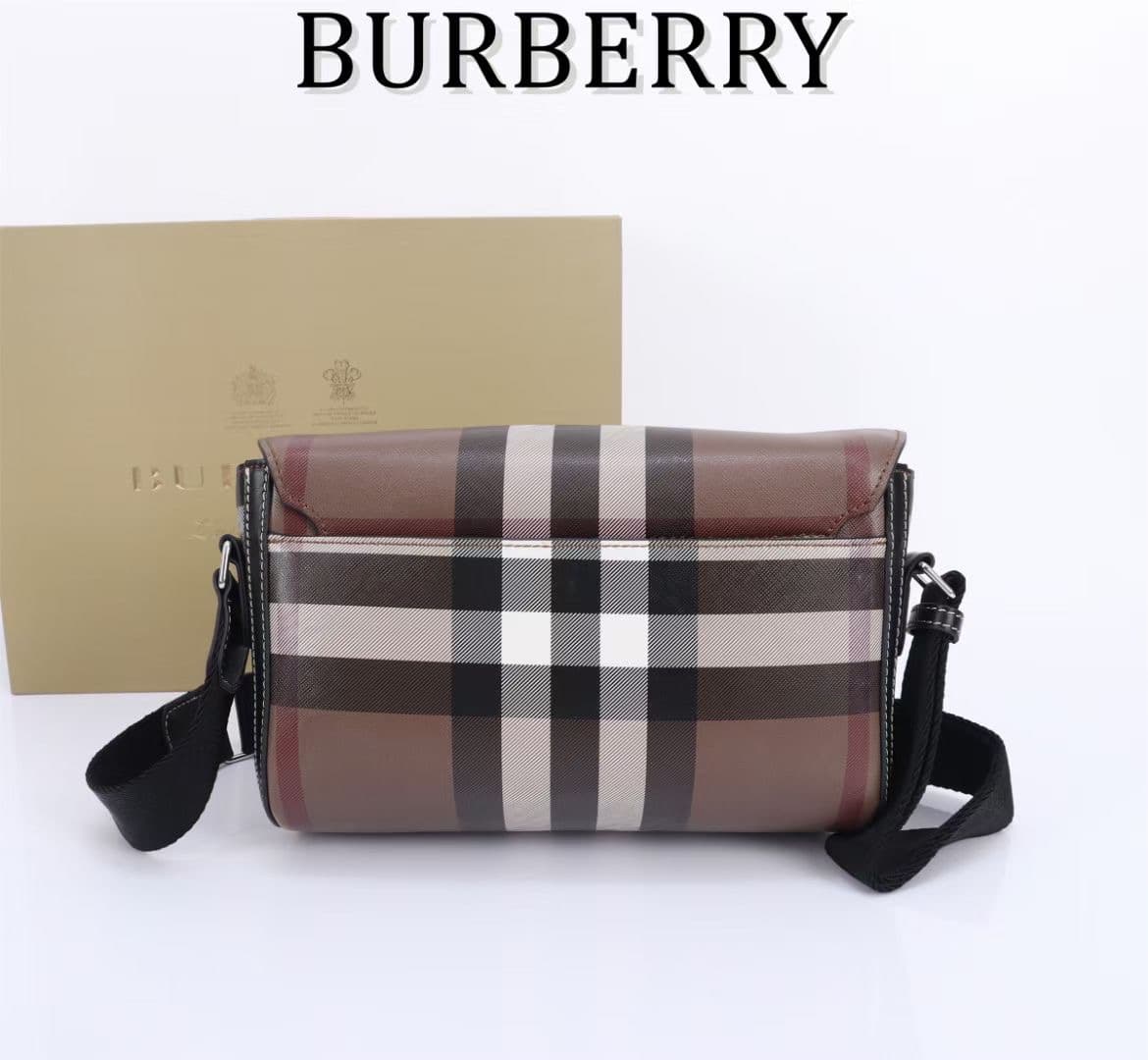 C142 The Balmain messenger bag features a structured design, with a brand’s charcoal-gray pattern. It is decorated with smooth leather details and an emblem design. There is a zipper pocket for storing small items. The adjustable shoulder strap ensures a  — image 5