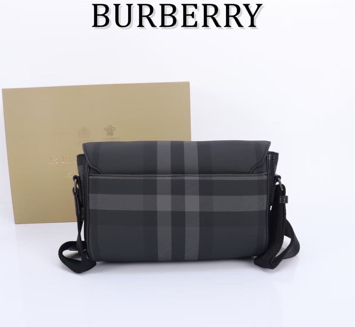 C141 The Balmain messenger bag features a structured design, with a brand’s charcoal-gray pattern. It is adorned with smooth leather details and a logo design. There are zipper pockets for storing small items. The adjustable shoulder strap contributes to  — image 2