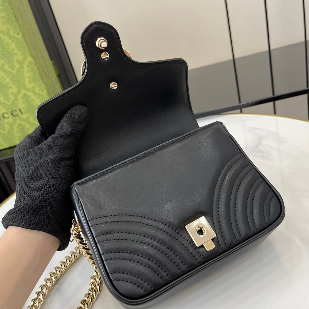 C4020 GG Marmont collection mini handbag. The GG Marmont collection presents a new silhouette with classic colors, exuding the charm of early autumn. This handbag is made of Gucci Black (Rosso Ancora) V-shaped leather sewn together, with detachable buckle — image 7