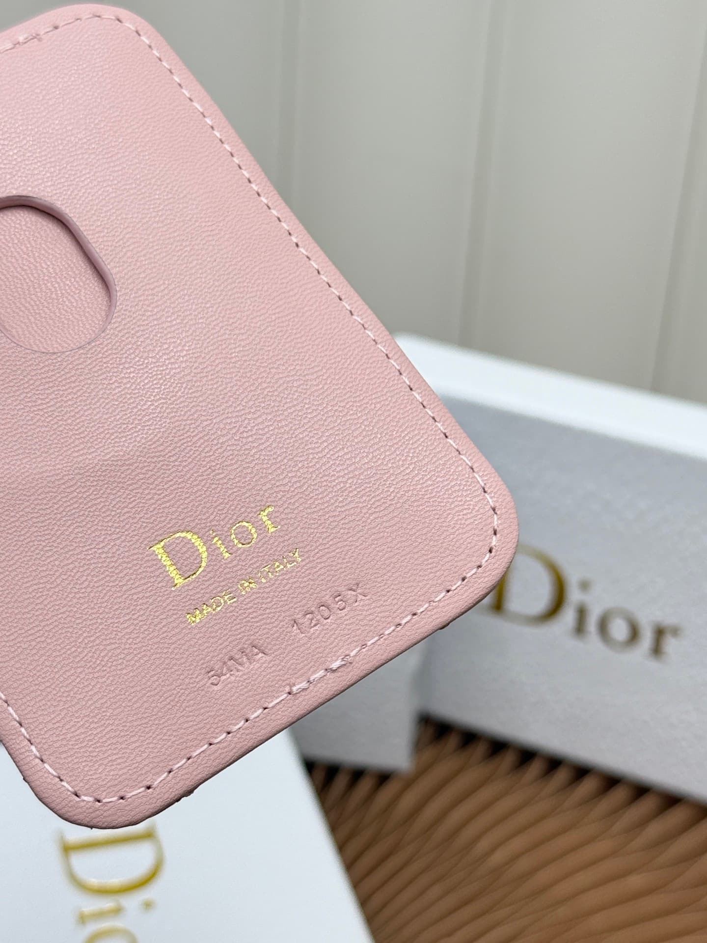 C389 This Lady Dior magnet card case is a delicate accessory that showcases the brand’s exquisite craftsmanship. The Cannage pattern in the lace style, along with the leather details, and the intricate bow ties represent new elements of Dior’s logo, highl — image 8