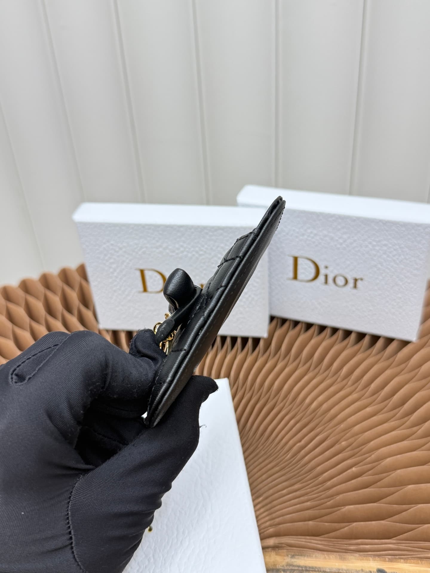 C388 This Lady Dior magnet card case is a delicate accessory that showcases the brand’s exquisite craftsmanship. The Cannage pattern and the羊 leather texture are adorned with intricate bow ties – these are new elements of the Dior logo, highlighting the e — image 7