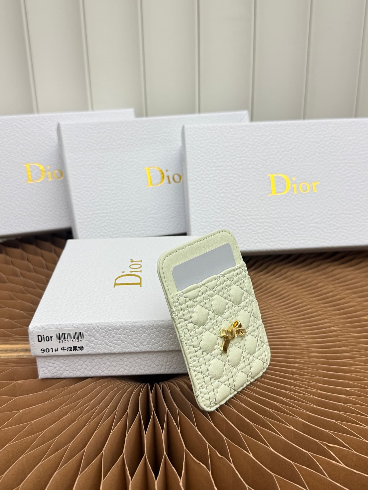 C393 This Baby Bow magnet card case is beautifully designed and practical. The black mini pattern with twill texture, along with the delicate bow ties, offer a clever new interpretation of the classic brand’s theme. This elegant card case can be used in c — image 2