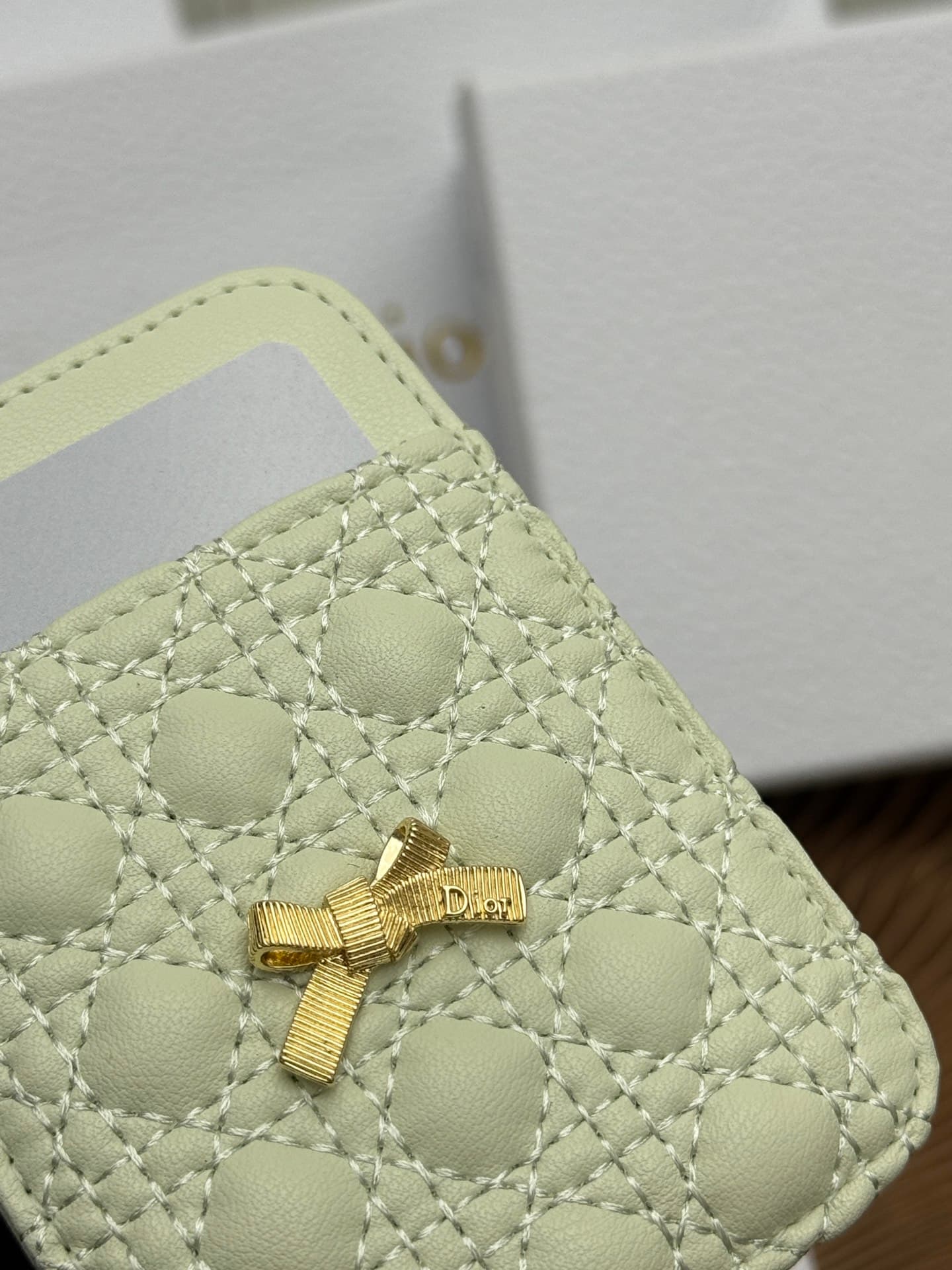 C393 This Baby Bow magnet card case is beautifully designed and practical. The black mini pattern with twill texture, along with the delicate bow ties, offer a clever new interpretation of the classic brand’s theme. This elegant card case can be used in c — image 5