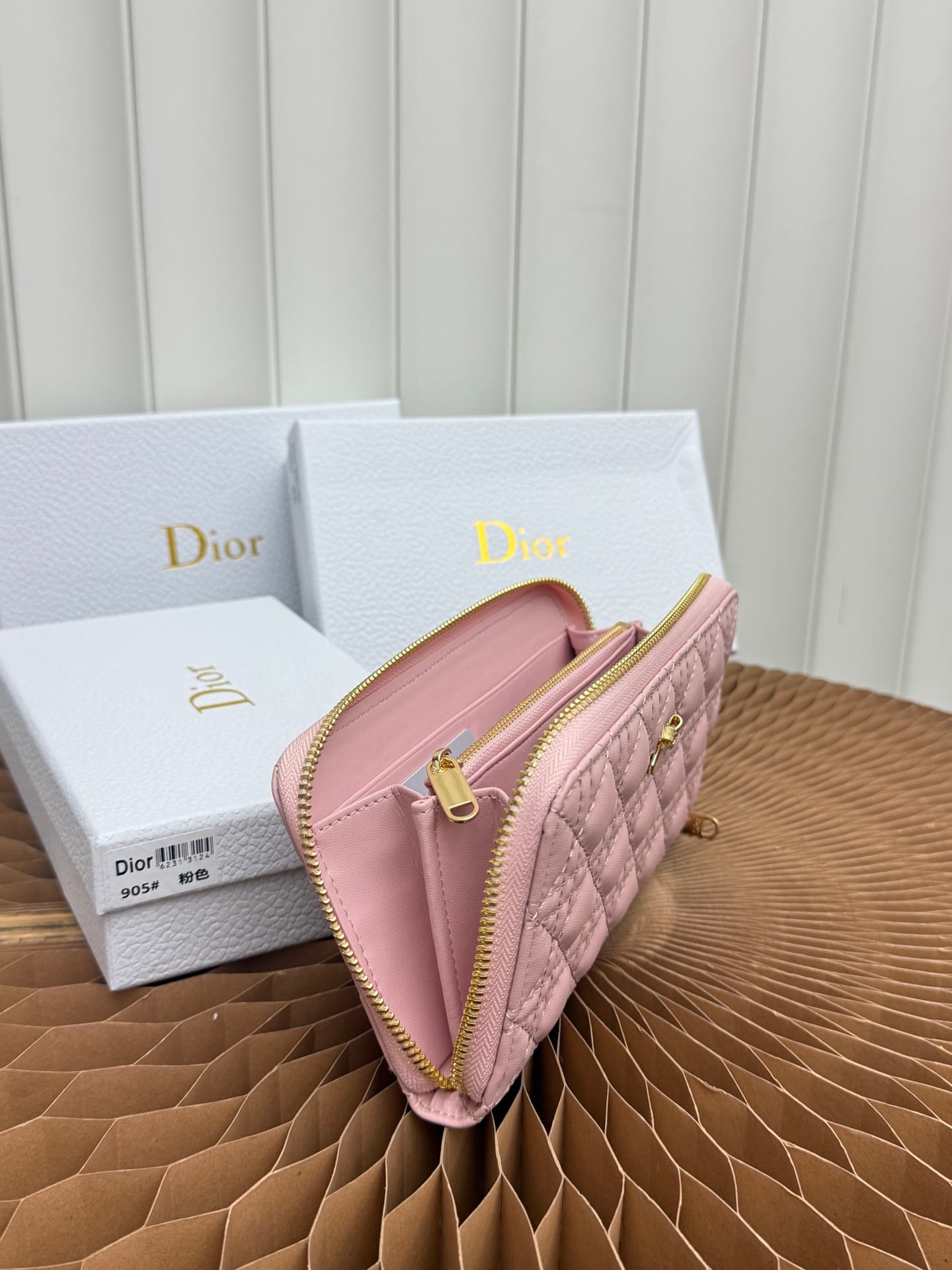 C404 This thin silver wallet from Baby Bow Voyageur is an essential accessory, exuding a simple and elegant style. The black mini rattan-checked pattern with lamb leather, combined with delicate bow ties, offers a clever new interpretation of the classic  — image 7