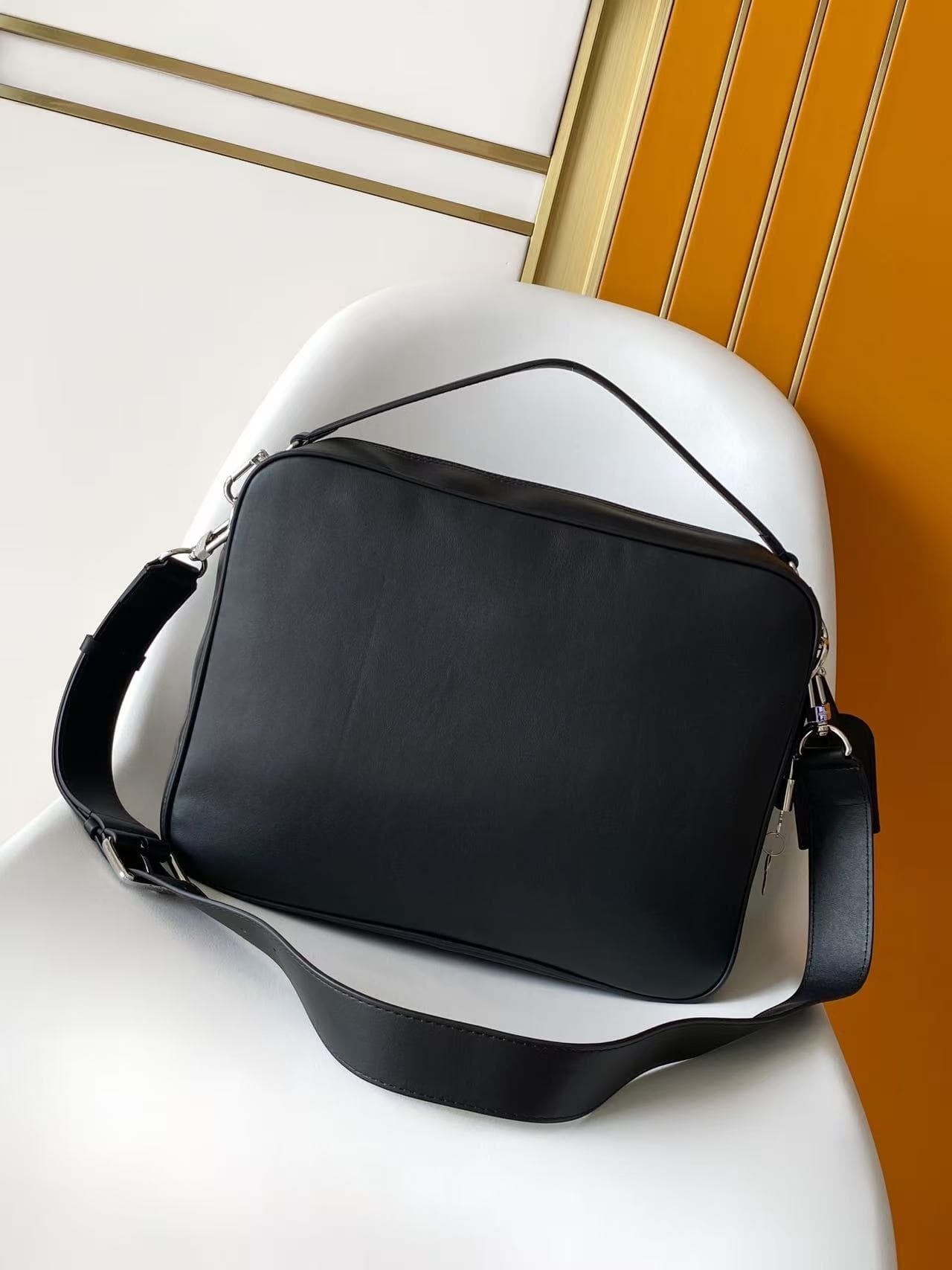 C5204 💰M27999 – Black and brown, top-quality original items. The dynamic 163 model features a comfortable, soft-tanned leather material, with a wide and sturdy design that draws attention. The interior is made of LV Blason pattern fabric, providing ample  — image 3