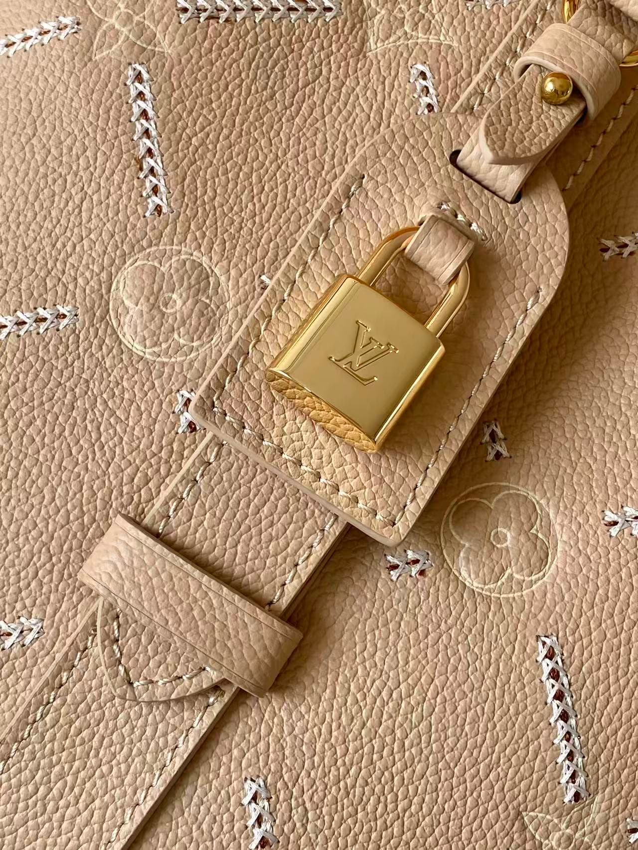 C5191 💰M28524 – The new medium-sized handbag features the Louis Vuitton Monogram Empreinte Couture logo, presented in elegant and versatile colors, making it an ideal choice for sophisticated everyday use. The bag’s shape is made from leather that has gon — image 6