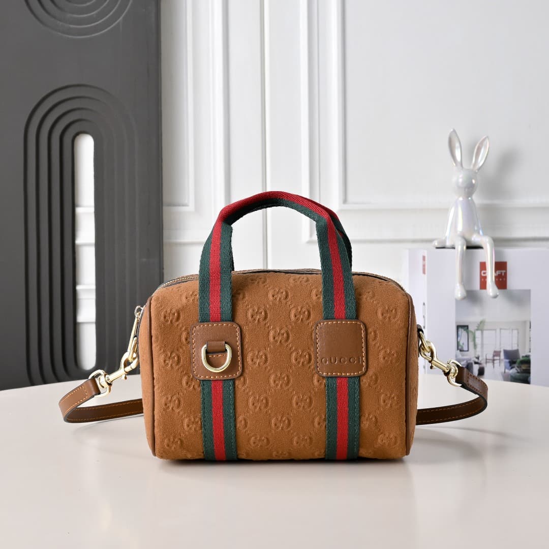 C3893 [Factory Direct Sale] Upgraded version. Inspired by Gucci’s iconic travel bag design, the brand has introduced the Mini GG handbag. This handbag is made from soft GG monogram cotton fabric; it features a Web strap handle and a detachable shoulder st — image 1