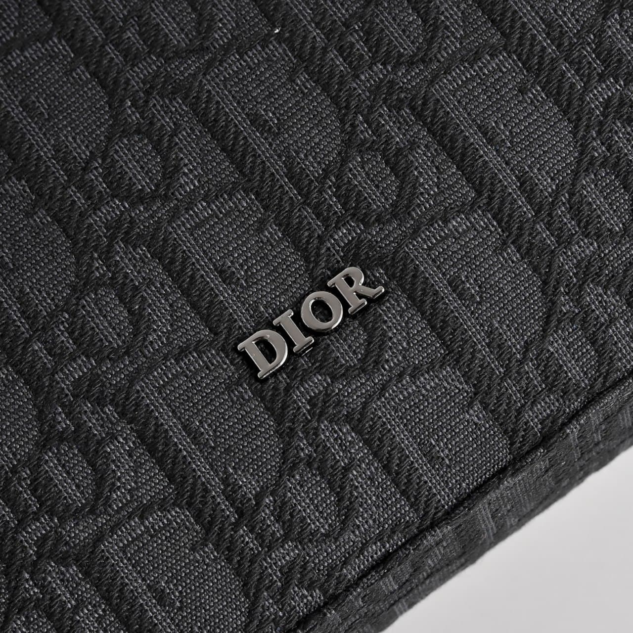 C1819 The A5 triangle-handbag is a new flagship product. It is crafted from beige and black Oblique print fabric, along with black grain leather for the flap design. The spacious zipper compartment can hold a phone, and there are also card slots. A detach — image 5