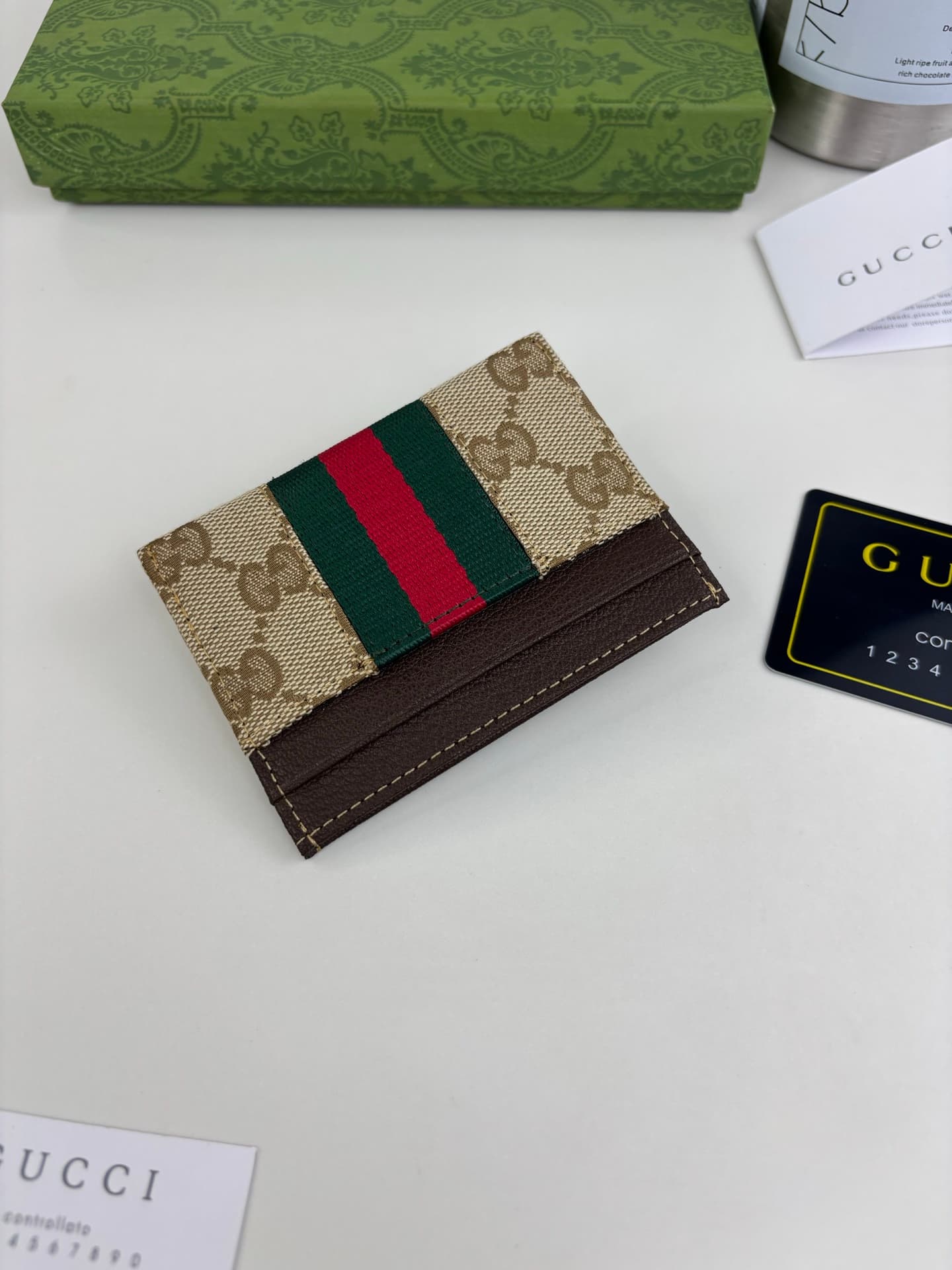 C3968 The Gucci Generation collection deeply explores the brand’s heritage elements, blending designs from different generations into a cohesive aesthetic narrative. The small accessories feature a tribute to the buckle design, integrating iconic details  — image 5