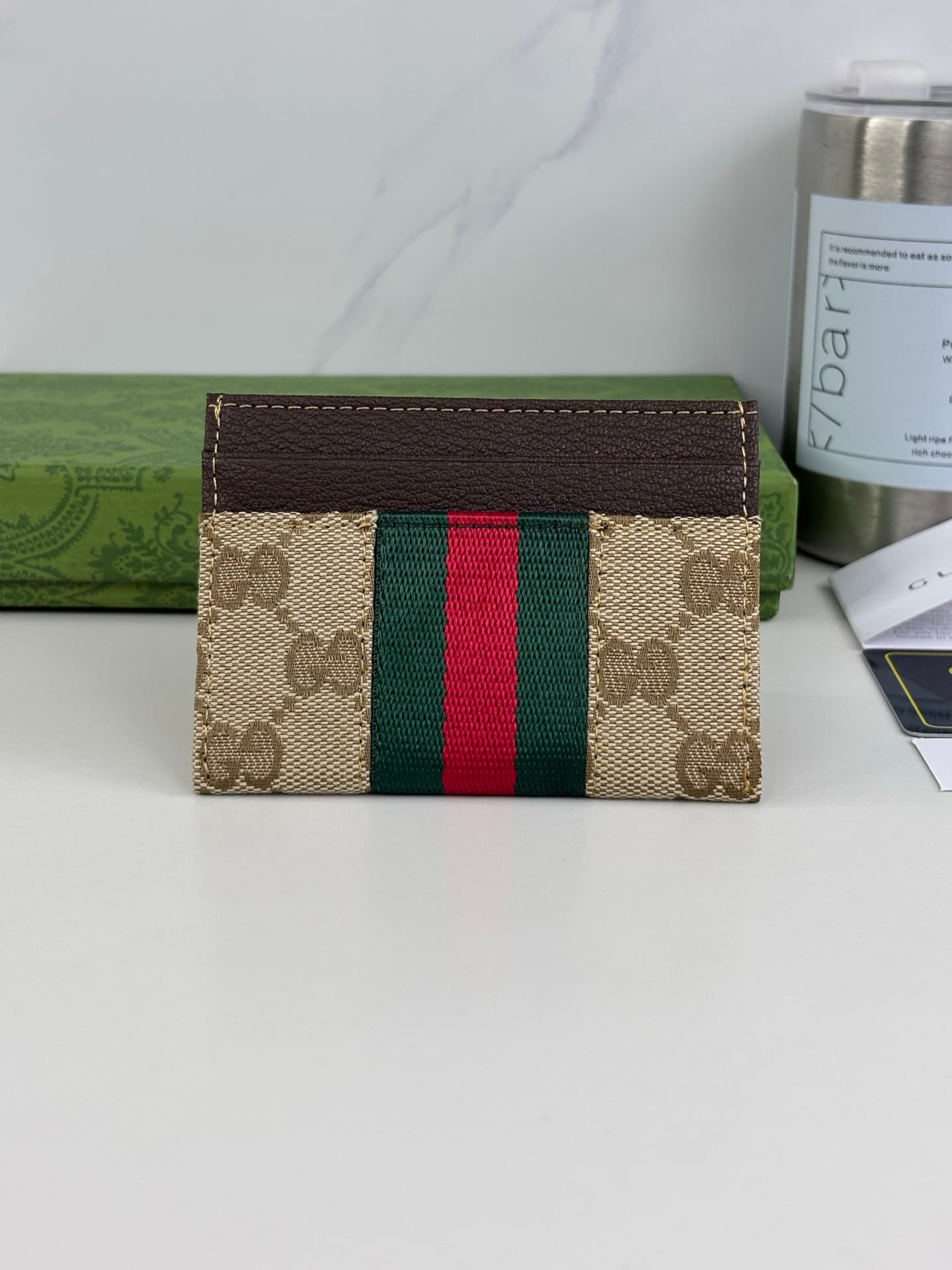 C3968 The Gucci Generation collection deeply explores the brand’s heritage elements, blending designs from different generations into a cohesive aesthetic narrative. The small accessories feature a tribute to the buckle design, integrating iconic details  — image 2