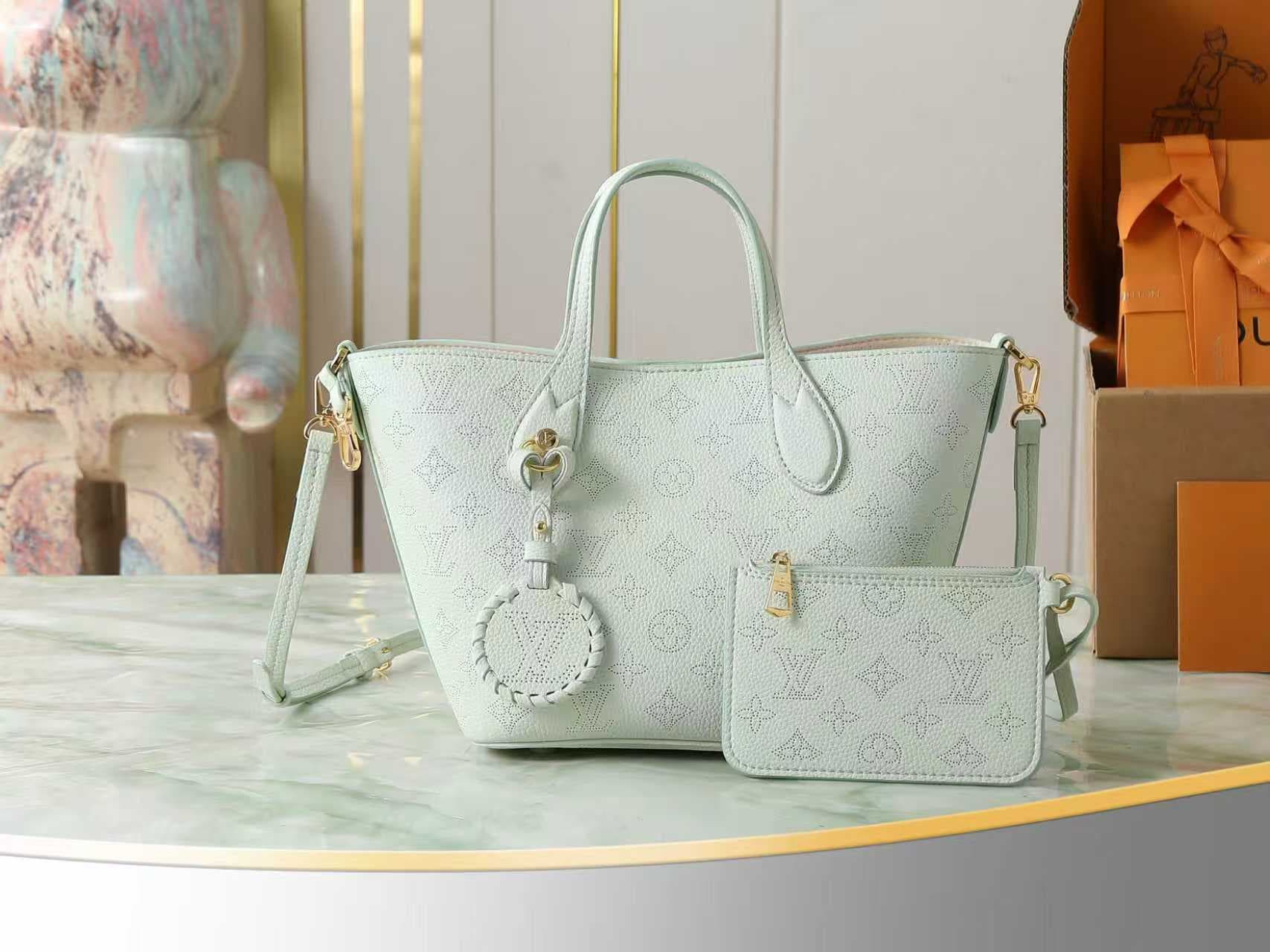 C5190 [Top-quality original product, exclusive real footage] M27599 Mint green full-leather perforated shopping bag BLOSSOM small handbag. This Blossom small handbag is made from classic perforated leather, with hooks and magnetic closures. It features a  — image 1