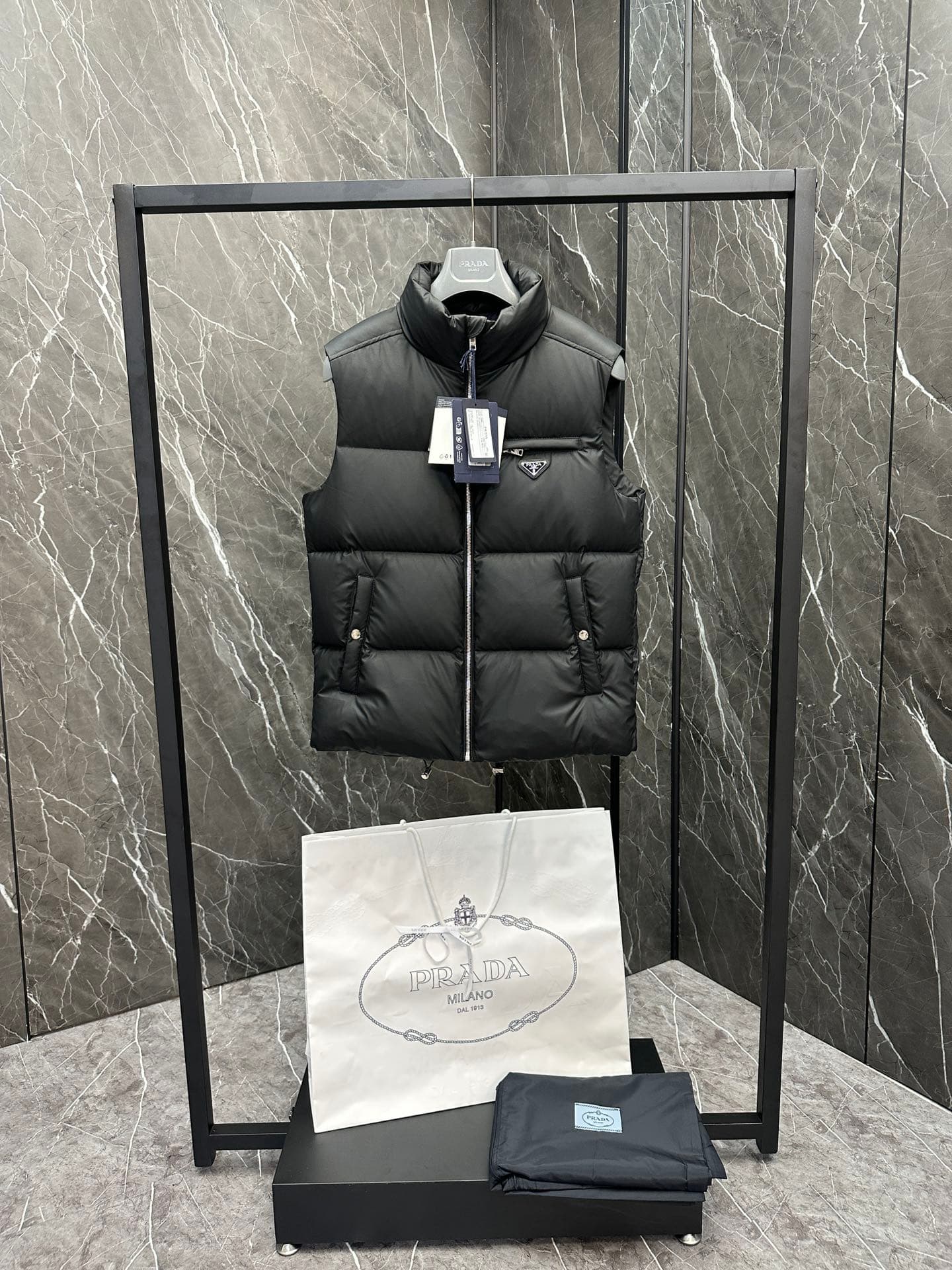C11090 Premium down ⬆️PRADA technological membrane down vest. The fabric of this garment is made from the latest 24 technology, which retains the soft and delicate texture of羊skin. It is lighter and easier to maintain compared to conventional leather down — image 6