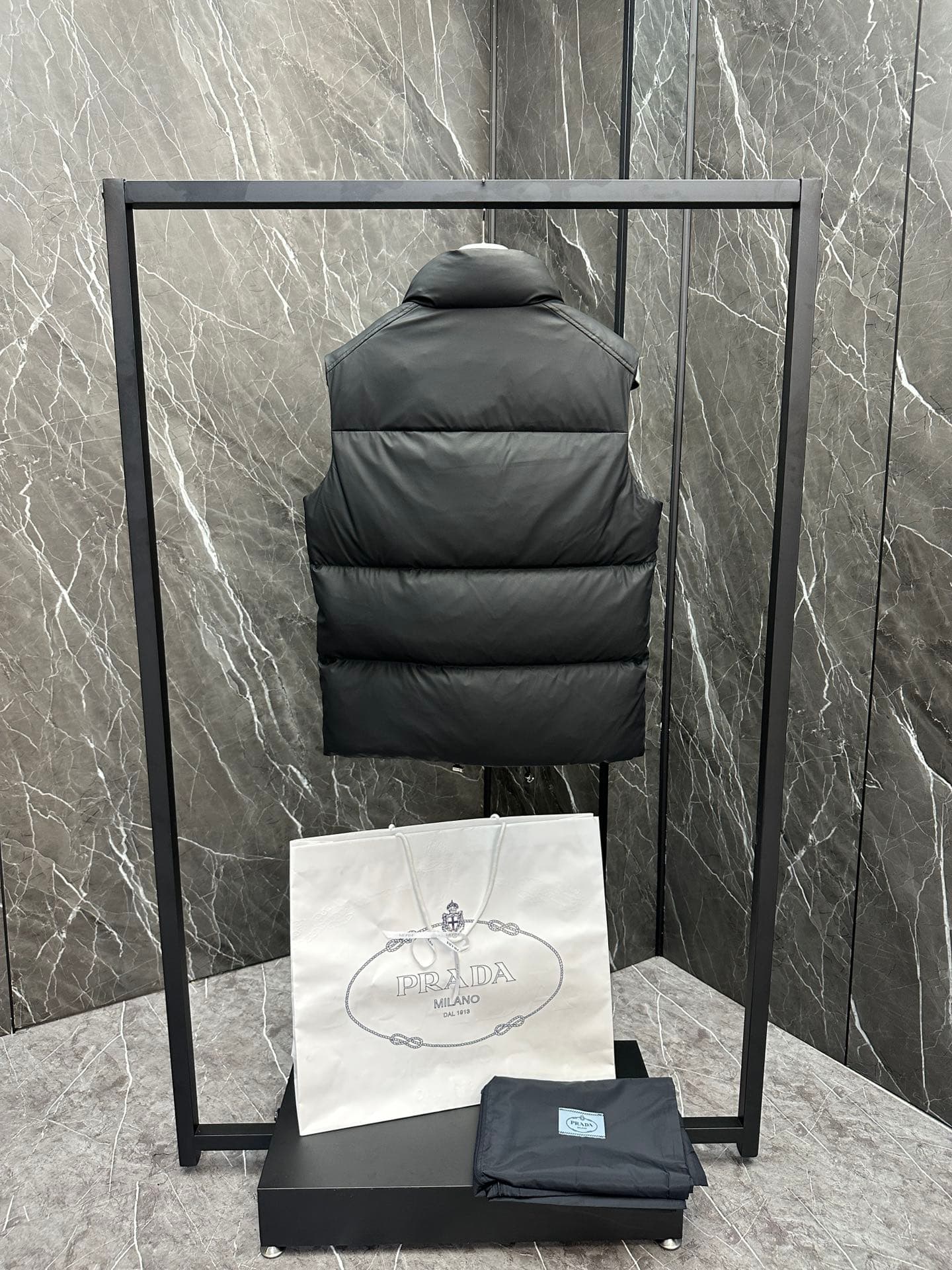 C11090 Premium down ⬆️PRADA technological membrane down vest. The fabric of this garment is made from the latest 24 technology, which retains the soft and delicate texture of羊skin. It is lighter and easier to maintain compared to conventional leather down — image 7