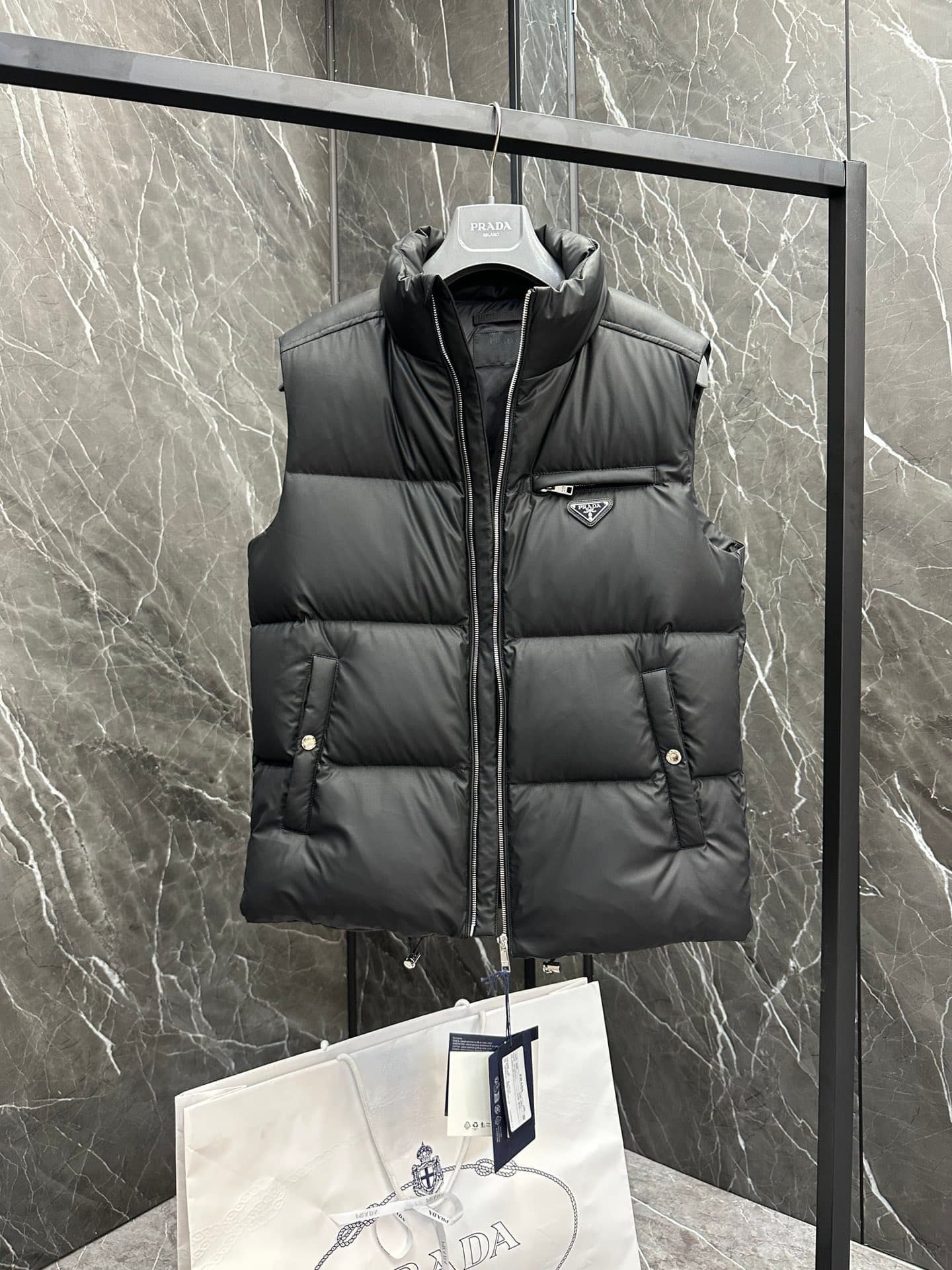 C11090 Premium down ⬆️PRADA technological membrane down vest. The fabric of this garment is made from the latest 24 technology, which retains the soft and delicate texture of羊skin. It is lighter and easier to maintain compared to conventional leather down — image 2