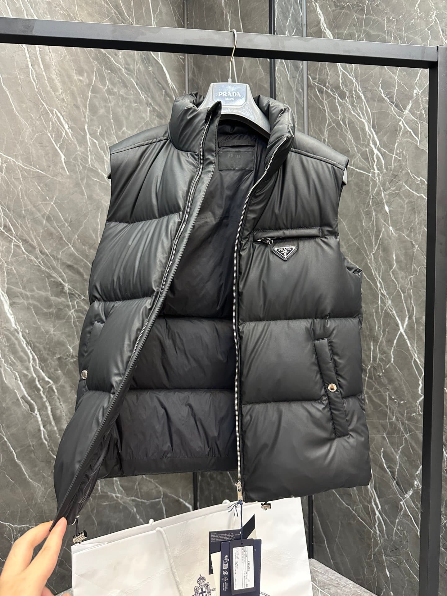 C11090 Premium down ⬆️PRADA technological membrane down vest. The fabric of this garment is made from the latest 24 technology, which retains the soft and delicate texture of羊skin. It is lighter and easier to maintain compared to conventional leather down — image 3
