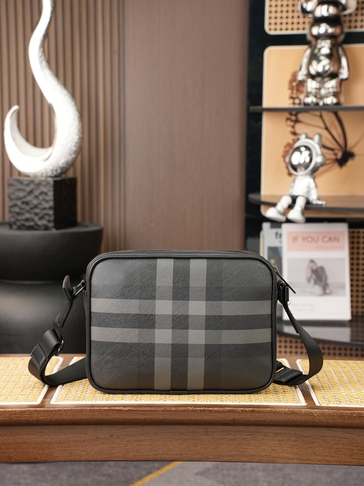 C84 B’s latest exquisite crossbody backpack features Burberry plaid patterns and smooth leather trim. It is adorned with the brand’s logo design, and comes with adjustable mesh straps. — image 2