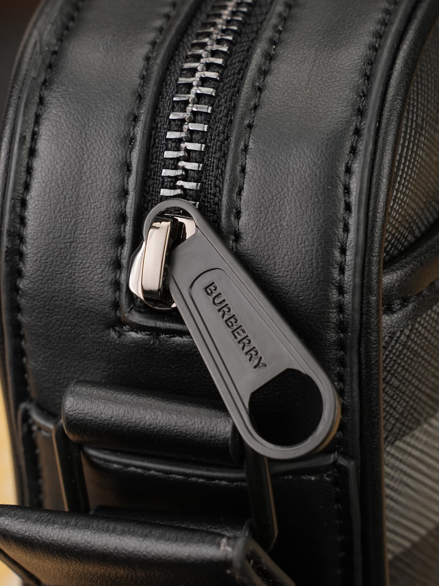 C84 B’s latest exquisite crossbody backpack features Burberry plaid patterns and smooth leather trim. It is adorned with the brand’s logo design, and comes with adjustable mesh straps. — image 6