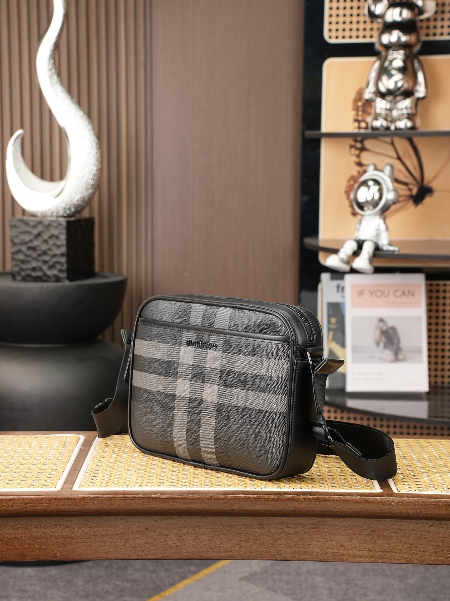 C84 B’s latest exquisite crossbody backpack features Burberry plaid patterns and smooth leather trim. It is adorned with the brand’s logo design, and comes with adjustable mesh straps. — image 3