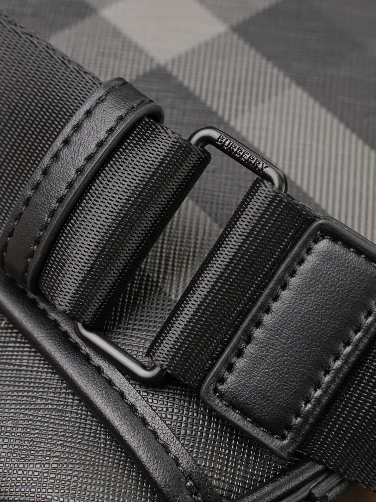 C84 B’s latest exquisite crossbody backpack features Burberry plaid patterns and smooth leather trim. It is adorned with the brand’s logo design, and comes with adjustable mesh straps. — image 7