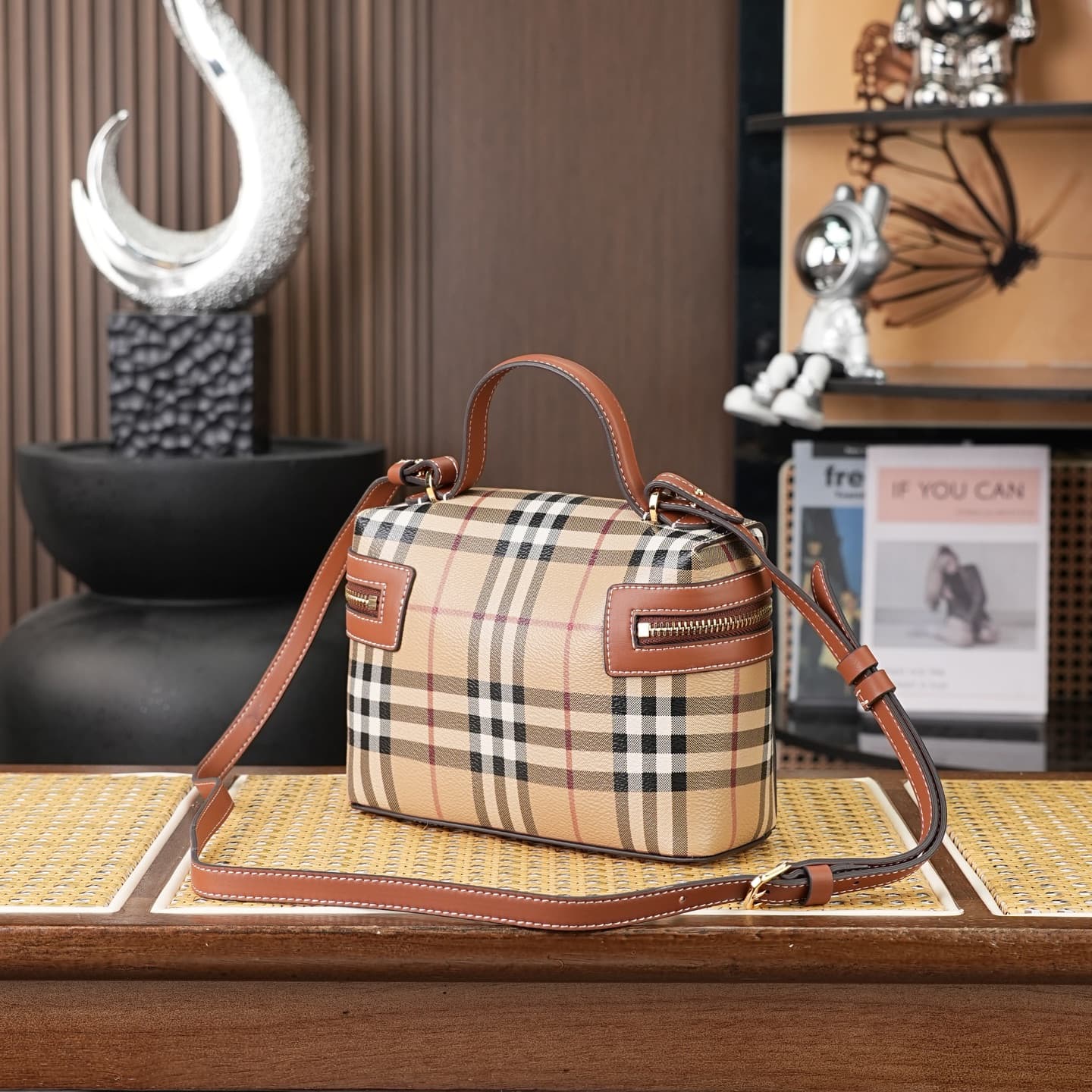 C92 The B family pattern Vanity bag is made from cotton-blend fabric and crafted by Italian artisans. It features a Burberry pattern print in the iconic classic beige color, along with leather trim with visible stitching. The bag has a structured design,  — image 3
