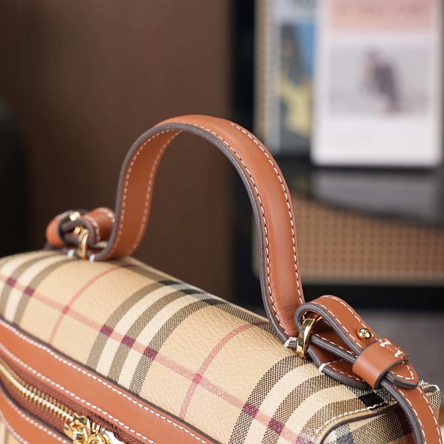C92 The B family pattern Vanity bag is made from cotton-blend fabric and crafted by Italian artisans. It features a Burberry pattern print in the iconic classic beige color, along with leather trim with visible stitching. The bag has a structured design,  — image 5