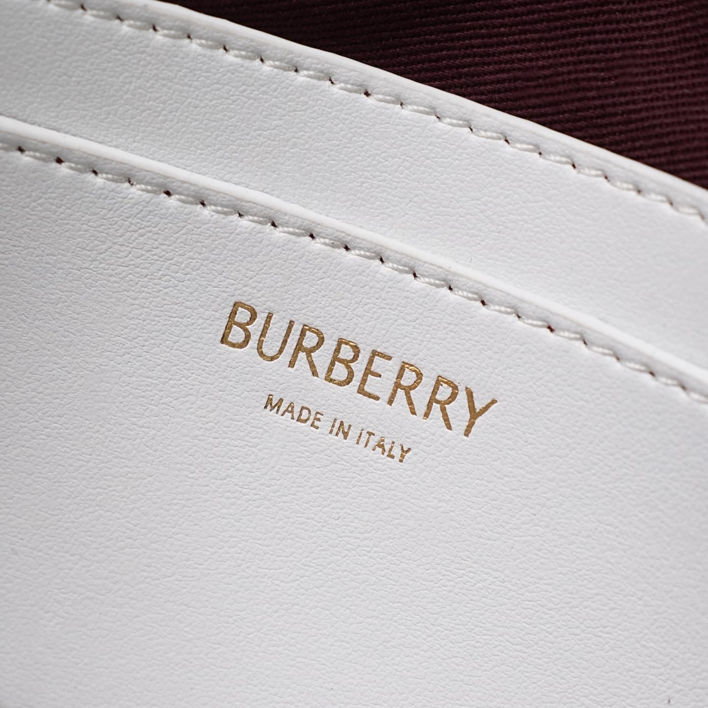 C93 The B family pattern Vanity bag is made from cotton-blend fabric and crafted by artisans in Italy. It features a Burberry pattern print in the iconic classic beige color, along with leather trim with visible ribbing. The bag has a stylish shape, inspi — image 8